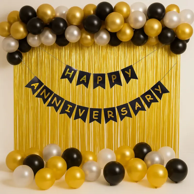 A festive arrangement showcasing Black and Gold Anniversary Decor, featuring black and gold balloons with a "Happy Anniversary" foil banner